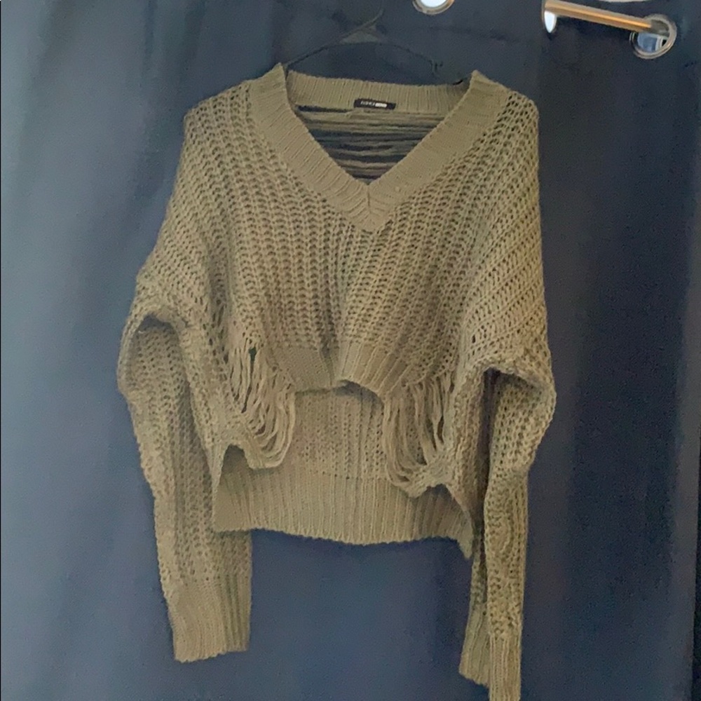 Adorable distressed sweater